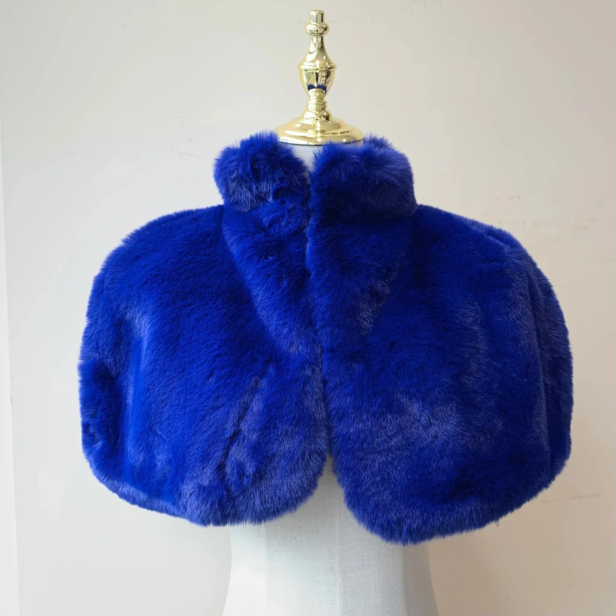 Faux Fur Cape with high neck effect. All Colours